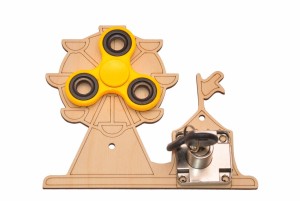 Karuzela żółty spinner i zamek do tablicy sensorycznej.