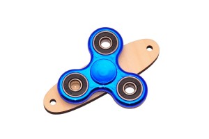 Niebieski spinner do tablicy sensorycznej na podstawce.  