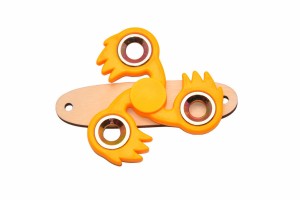 Żółty spinner do tablicy sensorycznej.  