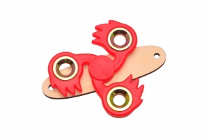 Czerwony spinner do tablicy sensorycznej.   