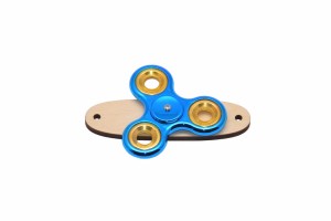Turkusowy spinner do tablicy sensorycznej metalic.
