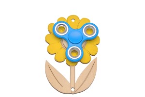 Dekor żółty kwiatuszek i niebieski spinner do tablicy manipulacyjnej.   